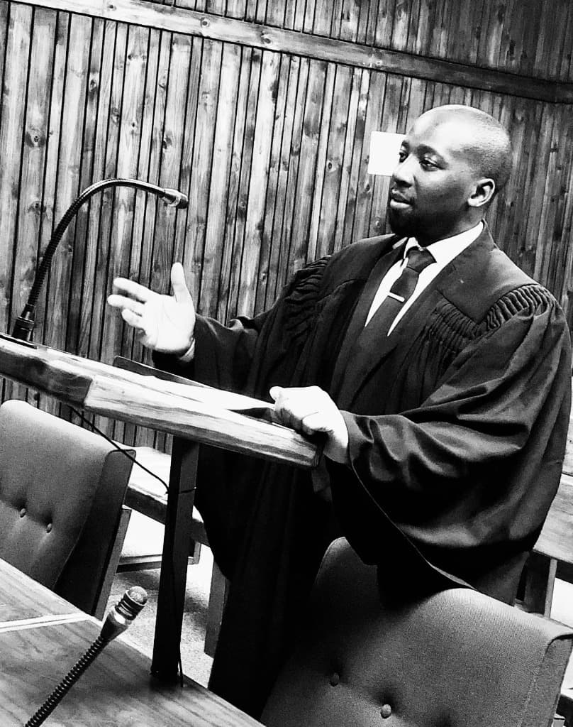 Johannes Motseo, founder & director of J Motseo Inc, addressing a courtroom from the lectern